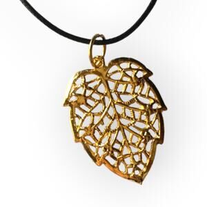 Gold tone leaf upcycled pendant necklace